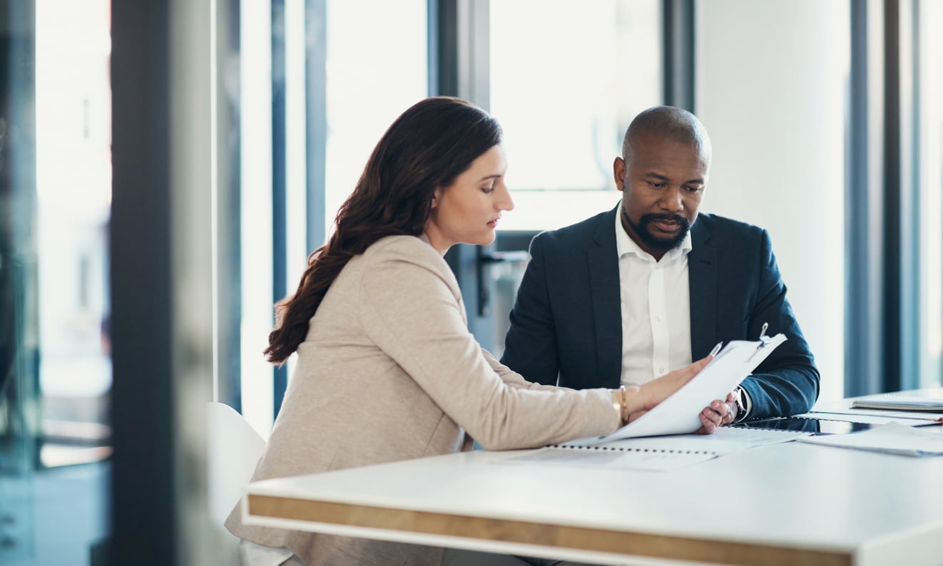 Business meeting, documents and people, clients or partner discussion of finance, loan and consultant advice. Taxes, review and woman with financial advisor or accountant, paperwork and information