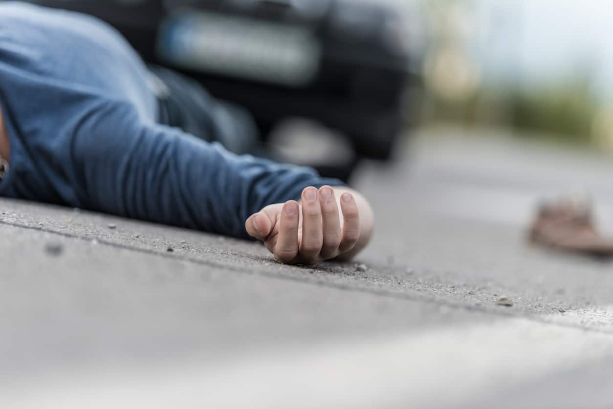 Traffic accident.Young man hit by a car
